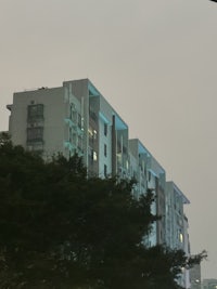 a blue building with a clock on top of it